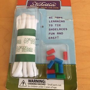 Sliderties Instructional Shoelace Tying System